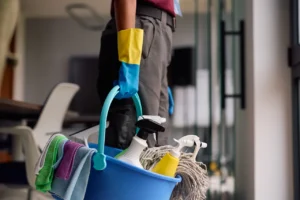 close up of professional cleaner with a bucket
